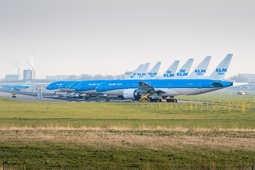 Due to the Covid-19 virus (Corona virus), KLM is forced to park their aircraft on the runway at its home base Amsterdam Schiphol Airport.
