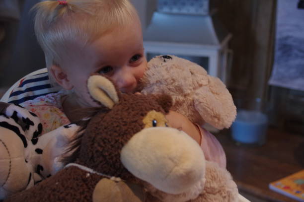 istock Toddler girl with teddy's 1221585739