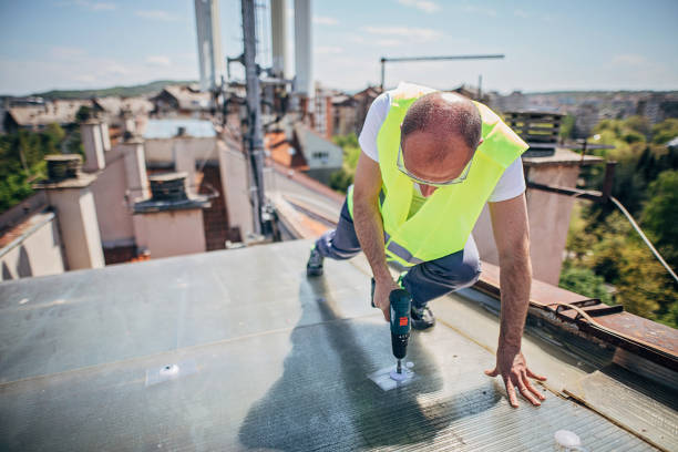istock One mature roof master with electric screwdriver 1221587290