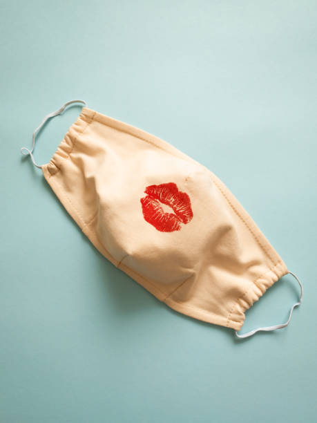 istock Protective medical mask with red lips 1221591591