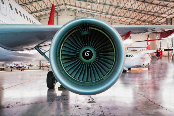 istock Close up of airplane engine in airport 1221592959