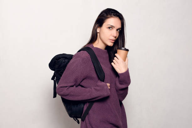 istock Young beautiful woman with smart phone 1221594728