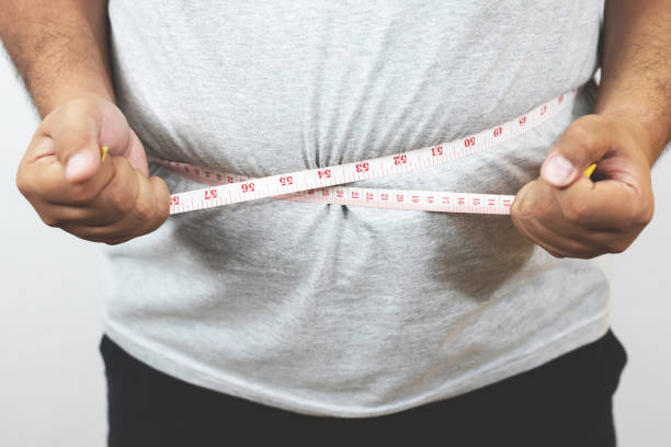 istock Obese men, they try to lose weight, such as diet and exercise every day. 1221596890