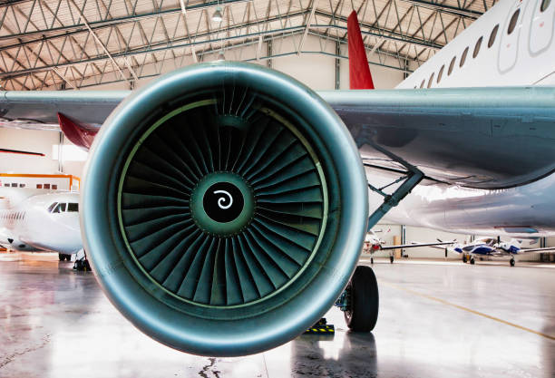 istock Close up of airplane engine in airport 1221597625