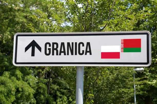 A sign and border between Poland and Belarus