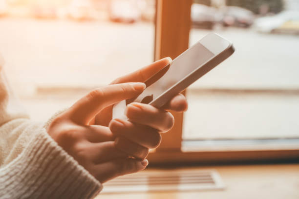 istock Women's hands use a smartphone for online shopping. 1221598380