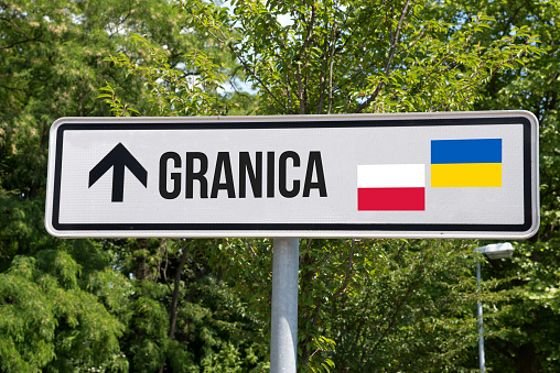 A sign and border between Poland and Ukraine