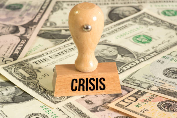 istock Dollar banknotes and stamps with the imprint crisis 1221602165