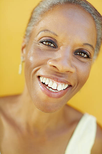 istock mature african woman smiling for joy 122160253