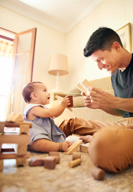 istock Taking care of his little angel 1221603251
