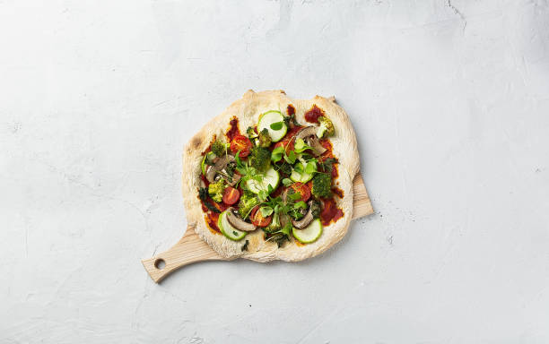 istock vegetarian pizza with vegetables on roman dough, pinsa. centrally 1221603503