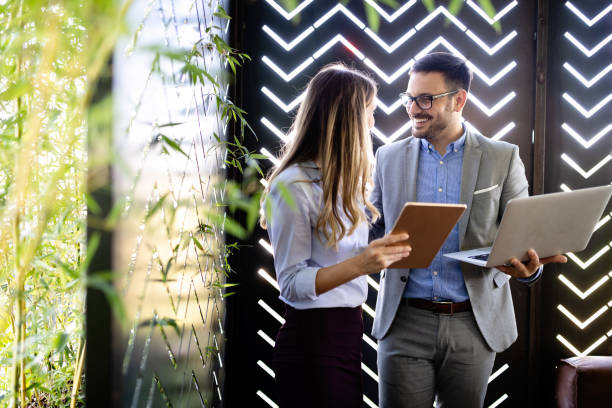 istock Successful company with happy employees in modern office 1221605066