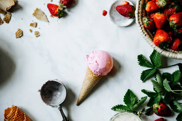 istock Strawberry ice cream in waffle cone 1221605475