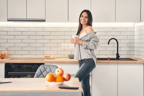 istock Charming female person looking straight at camera 1221605688