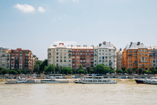 Pest district with Danube river in Budapest, Hungary Pest district with Danube river in Budapest, Hungary budapest danube river cruise hungary stock pictures, royalty-free photos & images