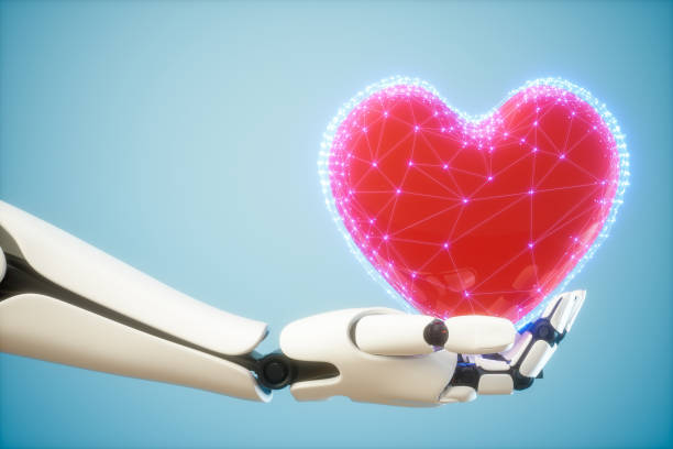 istock Medical Technology Concepts. Robot Hand Holding Heart. 1221608688