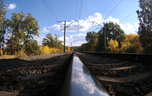 istock Railway road in autumn fall time close up rail 1221609017