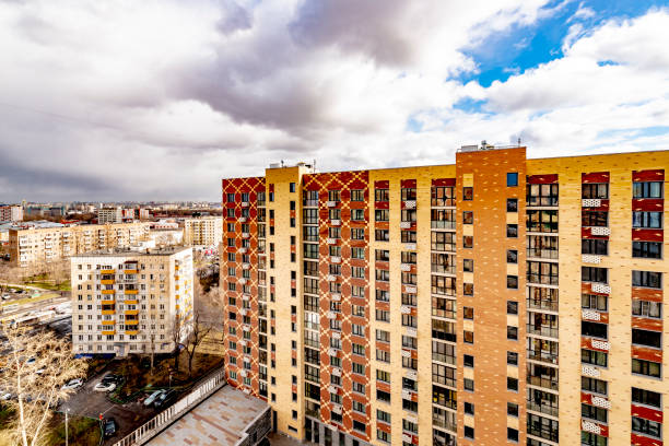 istock Modern multi-storey building in a new district of Moscow on a spring day 1221610853