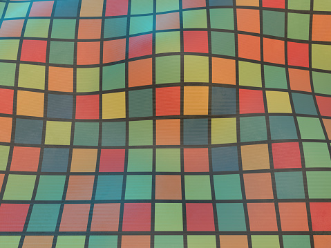 A multi colored abstract background with grid pattern