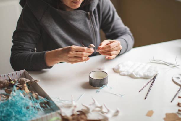 istock Woman making wool soft toys 1221616538
