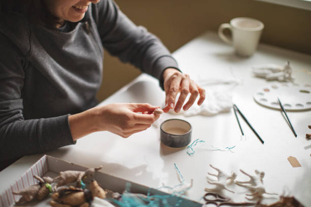 istock Woman making wool soft toys 1221616547
