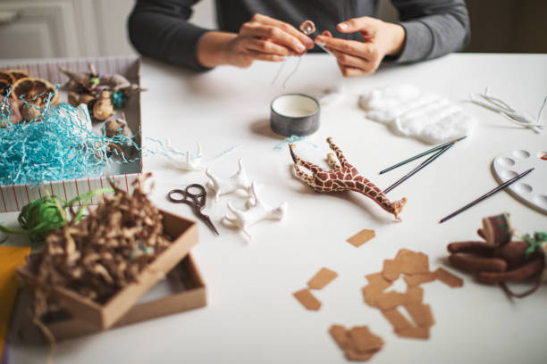 istock Woman making wool soft toys 1221616577
