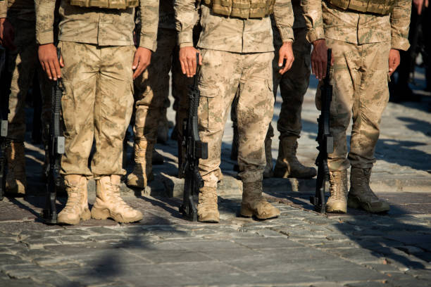 istock Turkish soldiers waiting in line with rifles 1221619373