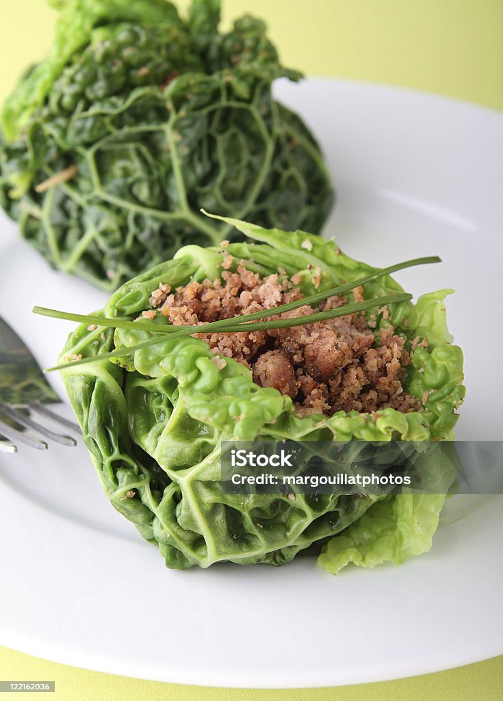 stuffed green cabbage plate of stuffed cabbage with meat Appetizer Stock Photo