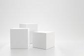 White studio template and cube pedestal on simple background with product shelf. Blank studio podium for advertising. 3D rendering.