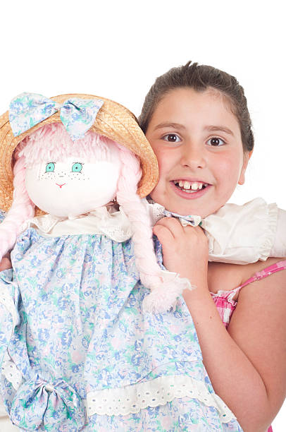 istock Little girl with doll 122162203