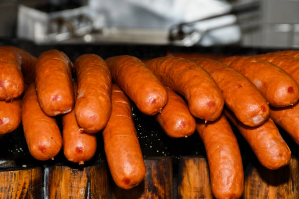 istock BBQ German Sausages being grilled by a vendor 1221622728