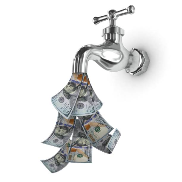 istock Falling money finance crisis faucet 1221623521
