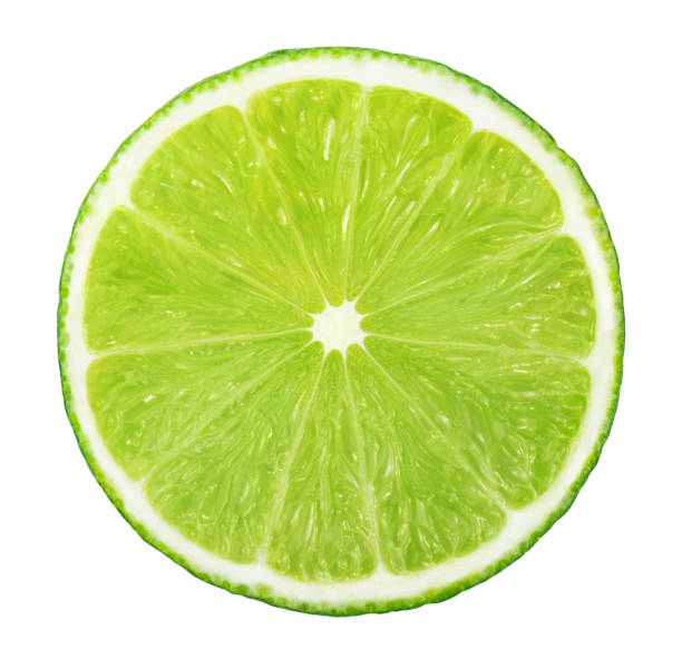 istock Slice of lime without shadow isolated on white background 1221625034
