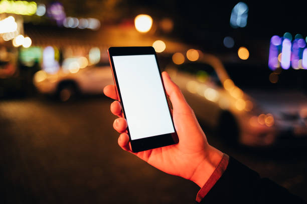 istock Woman's hand holding mobile phone 1221625682