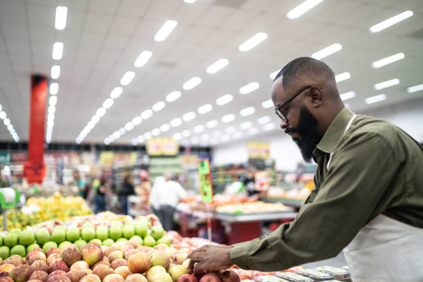 istock Employee working hard in supermarket 1221627612