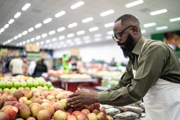 istock Employee working hard in supermarket 1221627614
