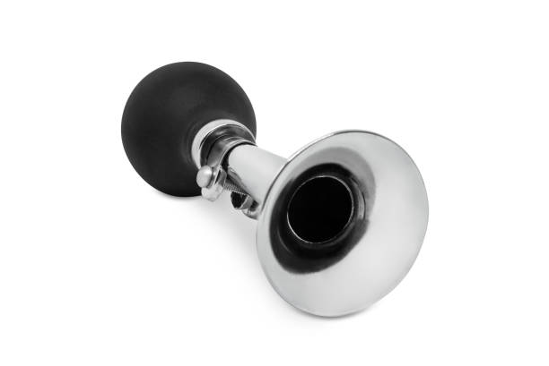 Metal horn trumpet isolated on a white background with shadow