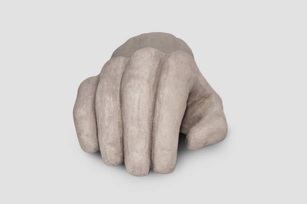 Close-up of massive marble toes and a simple sandal