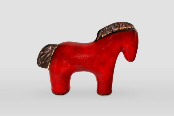 istock Decorative ceramic horse isolated on gray background 1221631477