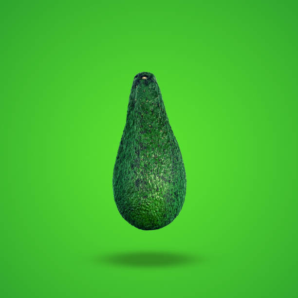 istock Flying avocado  on green background 1221631650