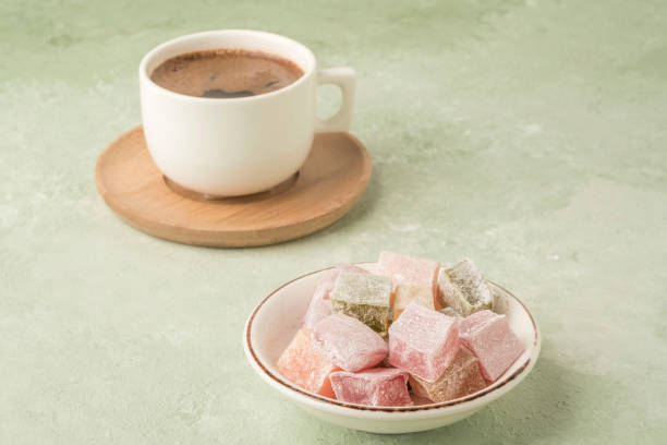 istock Turkish delights and coffee on green with copy space 1221631895
