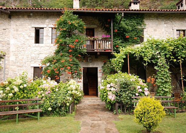 istock Colorful rural house with garden 122163278