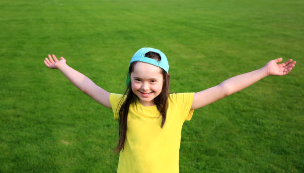 istock Little girl have fun on the stadium 1221634712