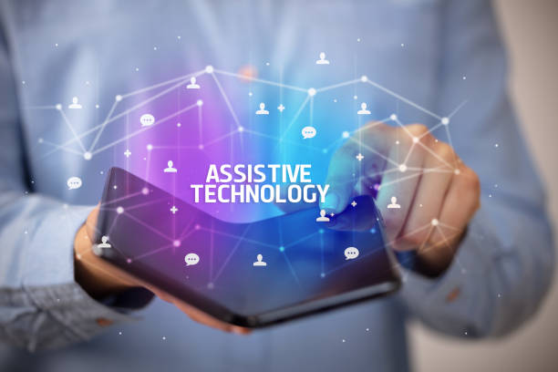 Businessman holding a foldable smartphone, new technology concept Businessman holding a foldable smartphone with ASSISTIVE TECHNOLOGY inscription, new technology concept assistive technology stock pictures, royalty-free photos & images