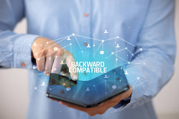 istock Businessman holding a foldable smartphone, new technology concept 1221637473