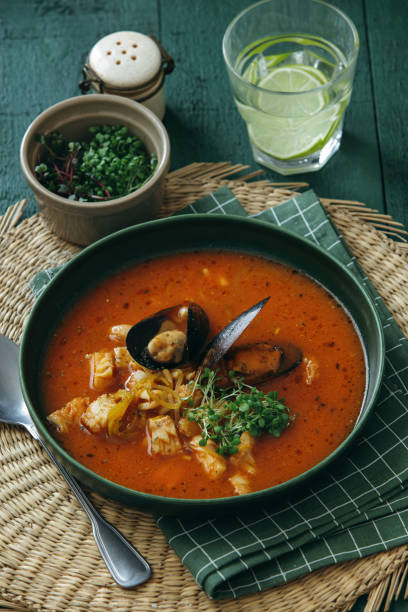 istock Cacciucco – Tuscan seafood stew on dark green background. 1221637544