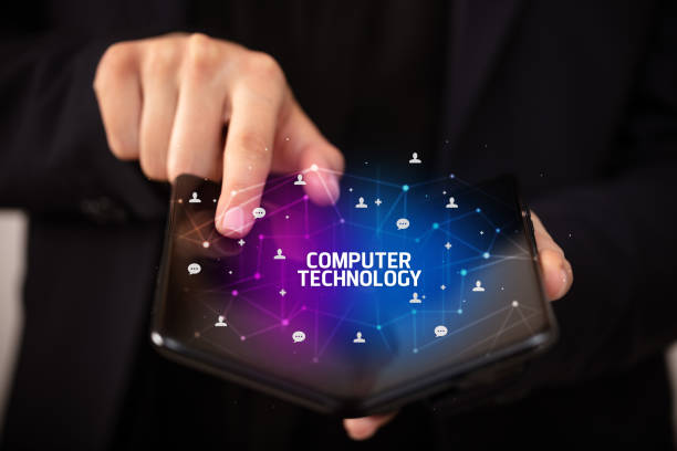 istock Businessman holding a foldable smartphone, new technology concept 1221638253