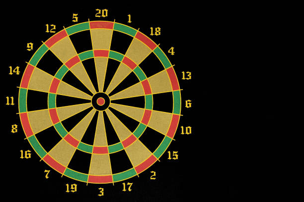 istock Dart Board on a black background, copy space 1221638636