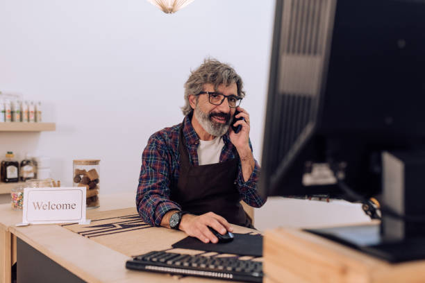 istock Entrepreneur running business at his grocery store 1221639010
