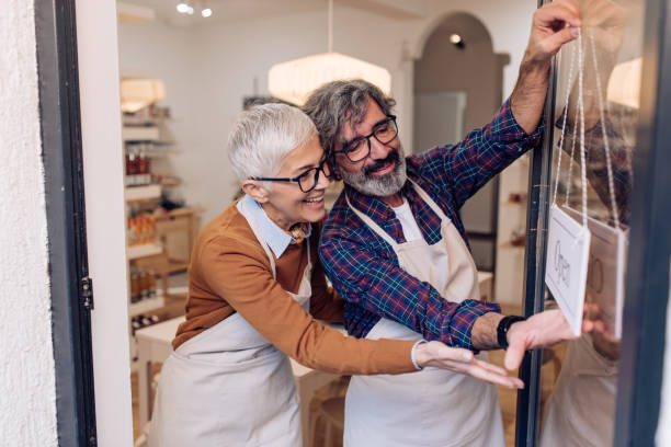 istock Mature entrepreneurs opening their new store 1221639081